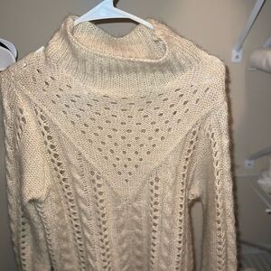 Lovely under layer sweater neutral with a little bit of shimmer to it.